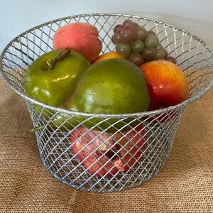 Silver sparkly wire basket full of decorative fruit